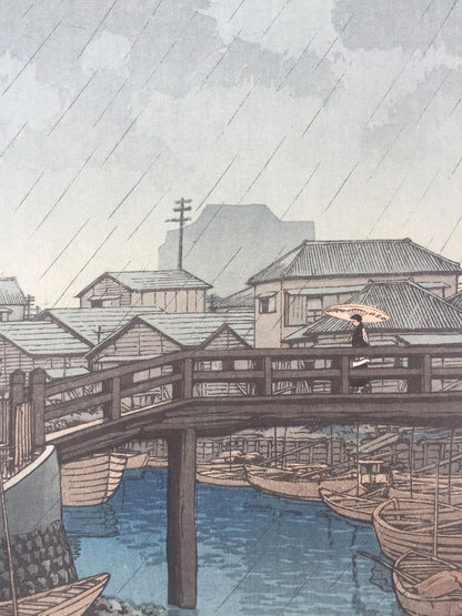 Hasui Kawase - Saison des pluies à Ryoshimachi Shinagawa